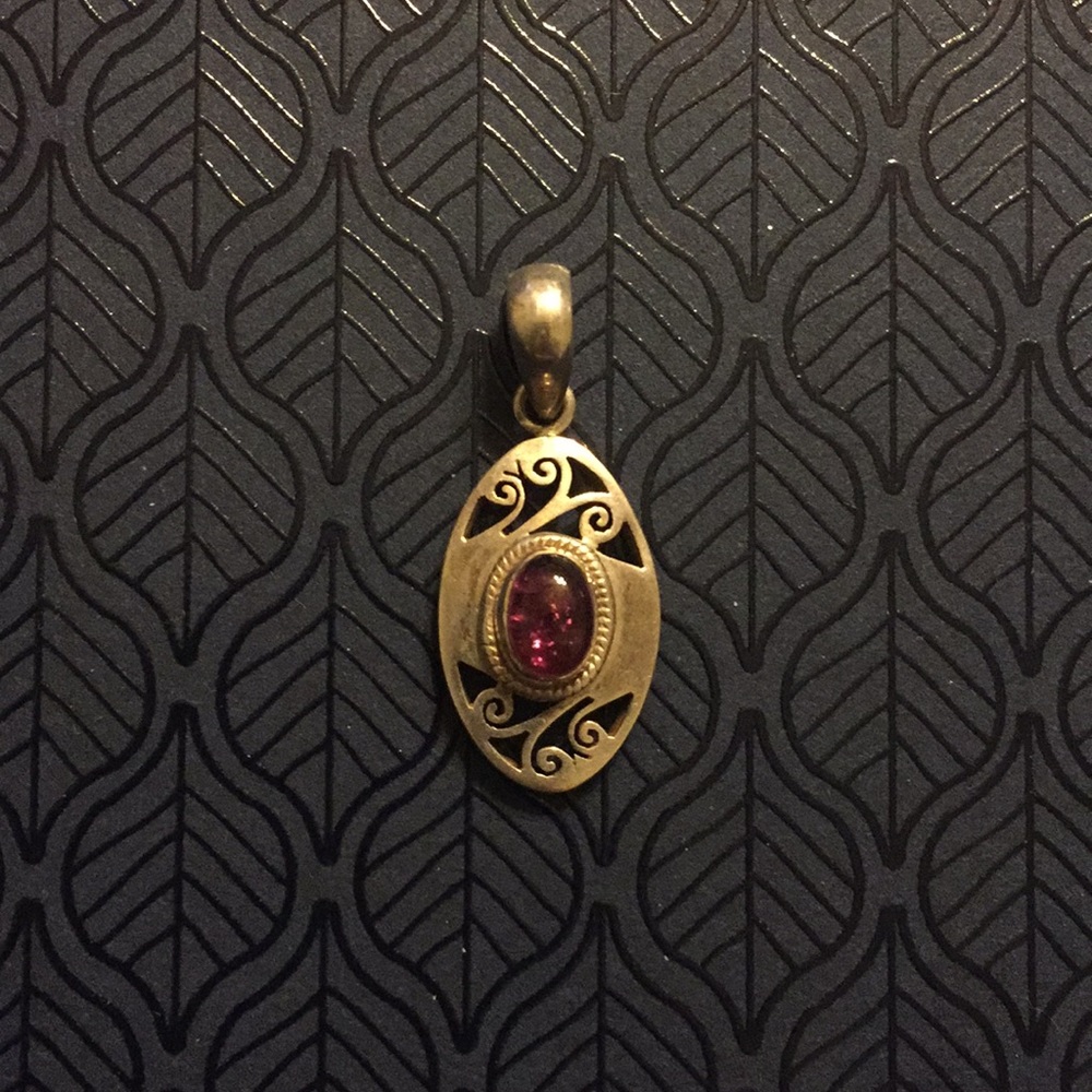 Vintage sterling silver pendant w/ purple stone